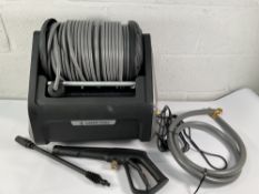 A pre-owned Giraffe Tools pressure washer (possibly Grandfalls, sold as seen).
