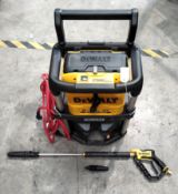 A pre-owned Dewalt 2 x 18v XR brushless cordless pressure washer unit only no batteries, with hose a