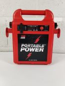 A pre-owned Portable Power 1800 rapid charge 12v jump starter, No cables.