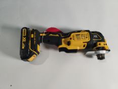 A pre-owned DeWalt DCS355 multi tool with DeWalt 18v battery.
