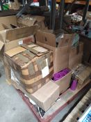 A pallet of assorted items to include plastic reusable cups, easter decorations and filter tips.
