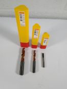 Thirty Sandvik coromant drill bits.