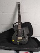A pre-owned Traveler EG-1 MOD-X electric six string guitar with case.