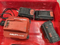 A pre-owned Hilti C 6-22 Battery Charger and three 22 Batteries.