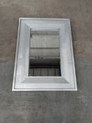 A Head West rectangle vanity mirror.