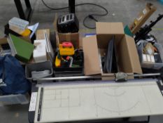 Two pallets of assorted preowned tech and office supplies, with Trimfast rotary trimmer.