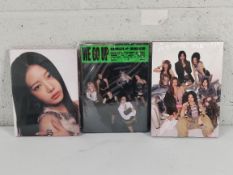 Three as new BABYMONSTER (베이비몬스터) We Go Up 2nd mini albums with versions to include postcard version