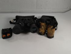 Three pairs of pre-owned Binoculars.