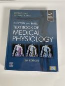 An as new Guyton and Hall Textbook of Medical Physiology (Hardcover).