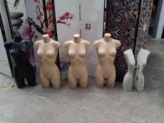 Four assorted female torso hanging manakins and one other (dusty due to storage).