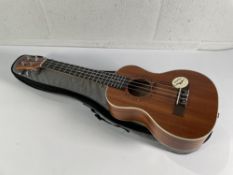 An as new Ranch R-L26 Ukulele (left-handed) with bag.
