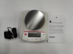 As new Ohaus NVE multi-purpose portable precision balances scales. NVE2102UK.