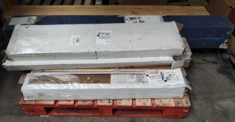 An assortment of wood flooring and related items.
