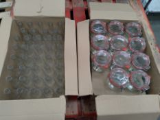 Two boxes containing twenty-three as new clip top preserving jars, and thirty-nine glass bottles wit