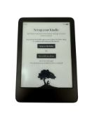 Pre-owned Amazon Kindle 16GB (11th Gen) E-Reader in Black (Amazon account unlocked).