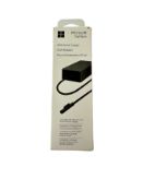 As new Microsoft Surface 65W Power Supply (Box sealed) (EAN: 196388144280 S/N: 0C130Y02YJ85B).