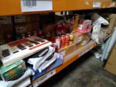 A shelf of assorted out-of-date food, drinks and related.