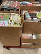 A large quantity of assorted books (new and pre-owned).