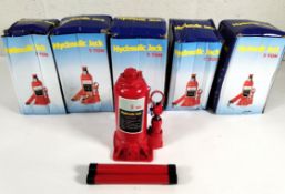 Five heavy duty hydraulic bottle jacks, red, 5 tonne capacity, boxed. (packaging slightly worn)