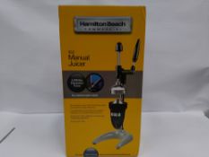 As new Hamilton Beach commercial 932 manual juicer. Boxed. 200lbs extraction force.
