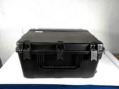 A pre-owned SKB flight case (73.5x46.5x29cm).