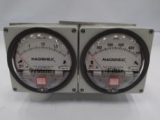 Preowned pair of Magnehelic pressure meters. Filter and system meters, reading in pascal and kilopas