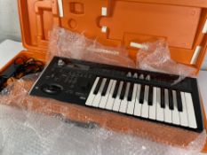 Pre-owned Korg Micro X Synthesizer with case.