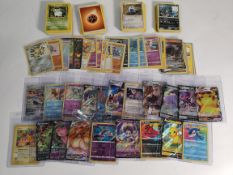 An assortment of Pokemon TCG trading cards.