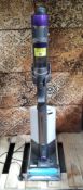 A Pre-owned Shark power detect cordless vacuum cleaner, with charger and some attachments, no box. (