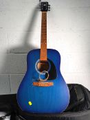A pre-owned Art & Lutherie wild cherry acoustic 6 string  guitar with case.