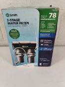 A boxed as new AO smith 2 stage water filter.