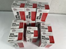 Eleven assorted Champion Aerospace Oil Filters.