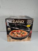 An as new Piezano pizza oven (requires uk plug adaptor) (box is destressed).
