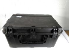 A pre-owned SKB flight case (73.5x46.5x29cm).