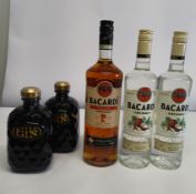 Two Bacardi Coconut rums 2 x 700ml, two Still gins 2 x 700ml and a Bacardi spiced rum 1L.
