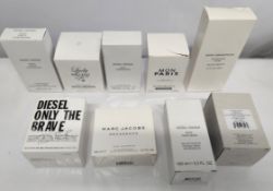 Twenty five boxed perfumes/testers and related to include YSL, Boss, Guerlain, Paco Rabanne and more