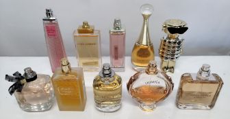 Thirty perfumes/testers and related to include Versace, Michael Kors, Dolce & Gabbana, Dior and more