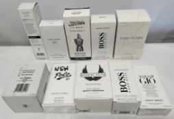 Thirty boxed perfumes/testers and related to include Jean Paul Gaultier, Boss, Versace, Armani and m