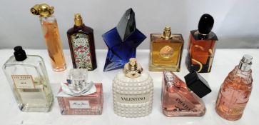 Thirty perfumes/testers and related to include Gucci, Prada, Mugler, Burberry and more! (please note