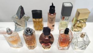 Thirty perfumes/testers and related to include Chanel, Michael Kors, Estee Laurder, Prada and more!
