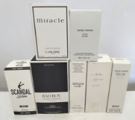 Thirty boxed perfumes/testers and related to include Jean Paul Gaultier, Dior, Armani, Carolina Herr
