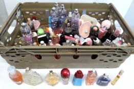 A large quantity of mixed perfumes/testers and related -approximately eighty (please note: some bott