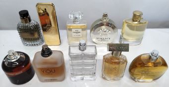 Thirty perfumes/testers and related to include Chanel, Versace, Boss, Lacoste and more! (please note