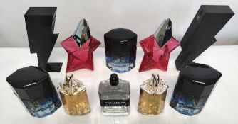 Thirty perfumes/testers and related to include Mugler, Carolina Herrera, Paco Rabanne, Givenchy, Iss
