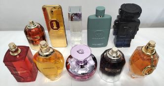 Thirty perfumes/testers and related to include Jean Paul Gaultier, Paco Rabanne, Marc jacobs, Gucci