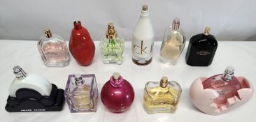 Thirty perfumes/testers and related to include Chanel, Armani, Gucci, Jean Paul Gaultier and more! (