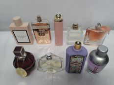Thirty perfumes/testers and related to include Boss, Armani, Givenchy, Chloe and more! (please note:
