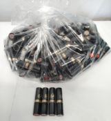 Approximately fifty Laura Paige lipsticks, various colour shades, sealed.