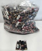 Approximately one hundred various brands of lipsticks, various colour shades to Laura Paige, CCUK, C