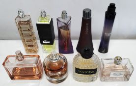 Thirty perfumes/testers and related to include Estee Lauder, Lacoste, Armani, Gucci, Boss and more!